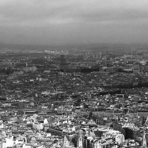 A black and white panorama of a European city