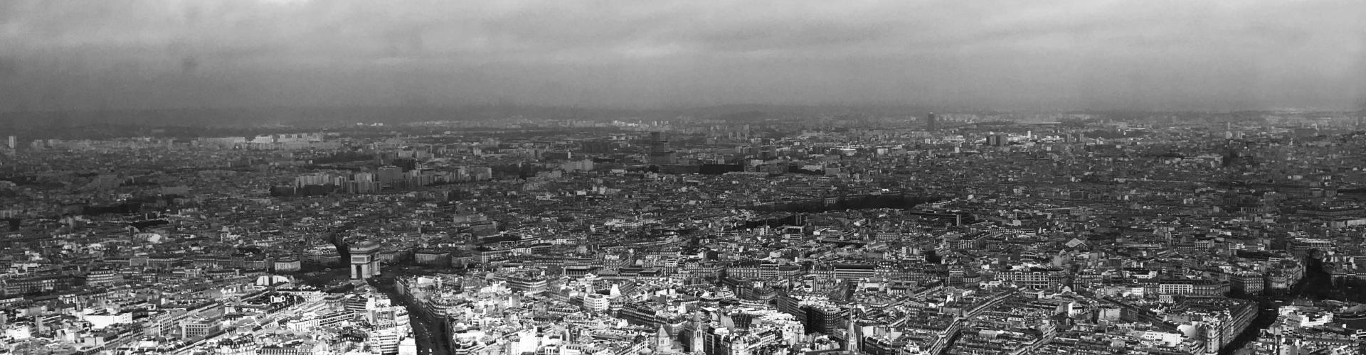 A black and white panorama of a European city