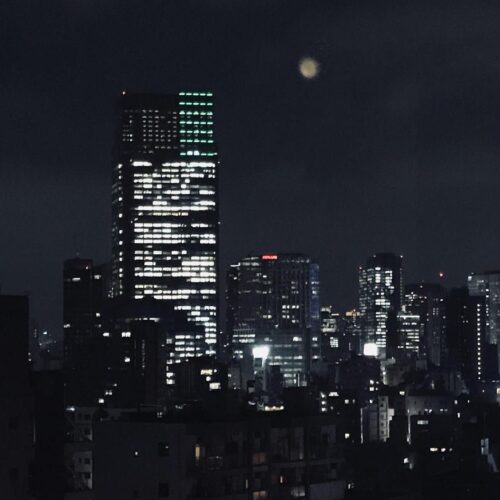 A city lit up at night.
