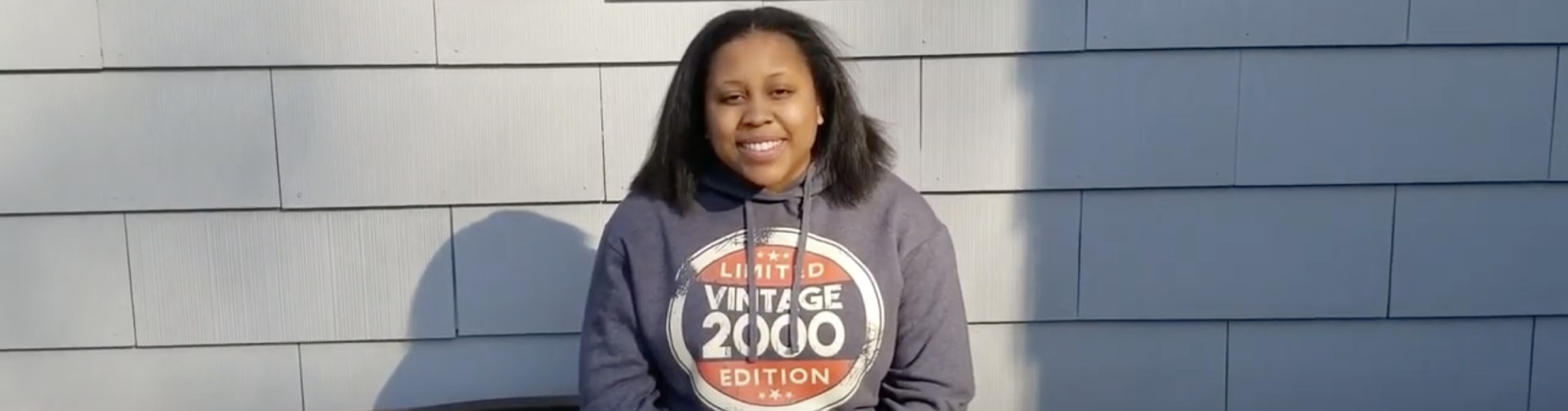 Daijah Patton wearing a Limited Vintage 2000 Edition Hoodie