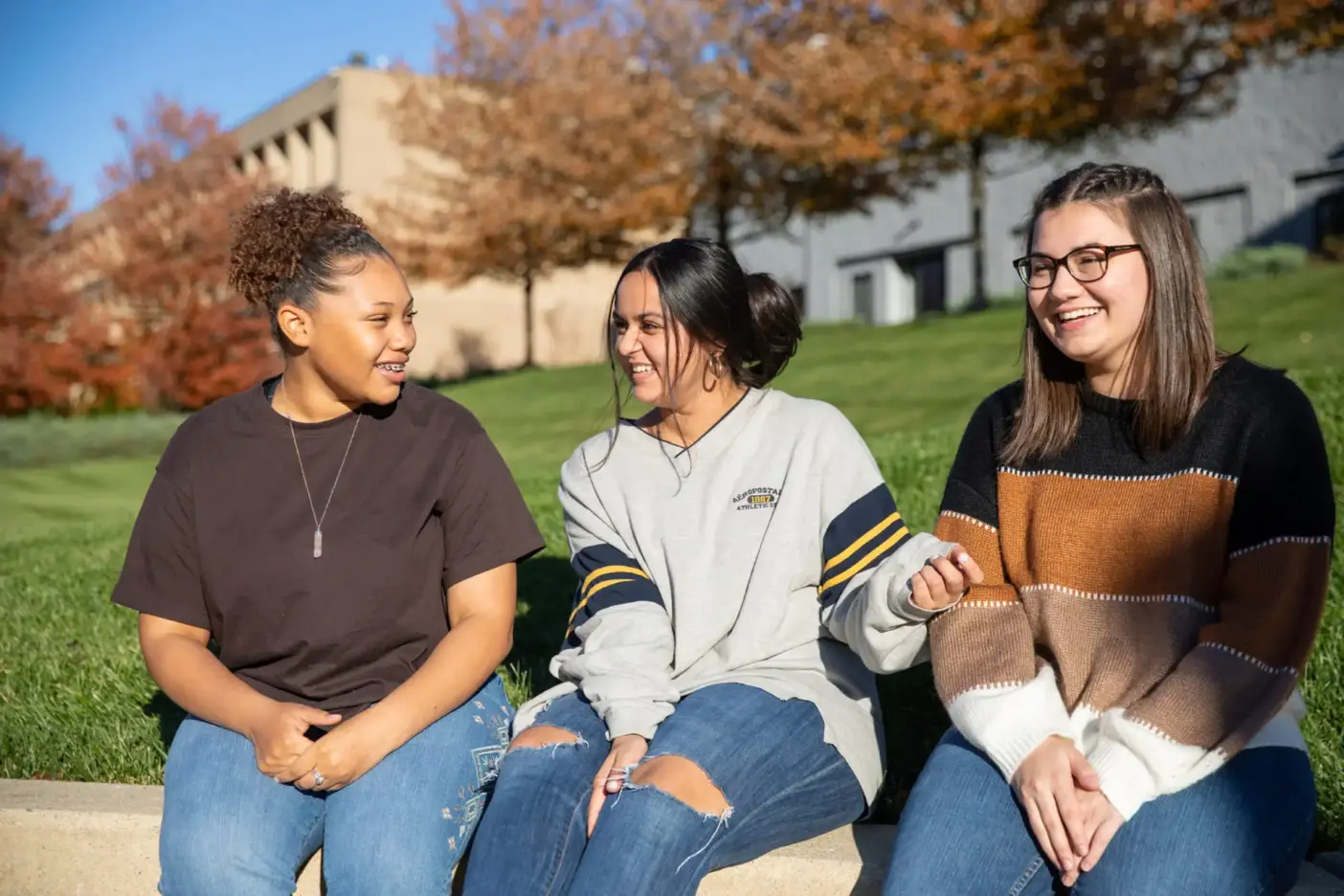 Students enjoy a Special Admission Program outside on campus.