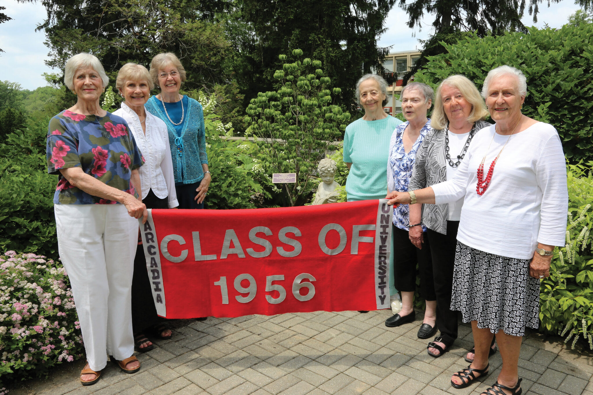 A group photo of alumni students from the Class of 1956