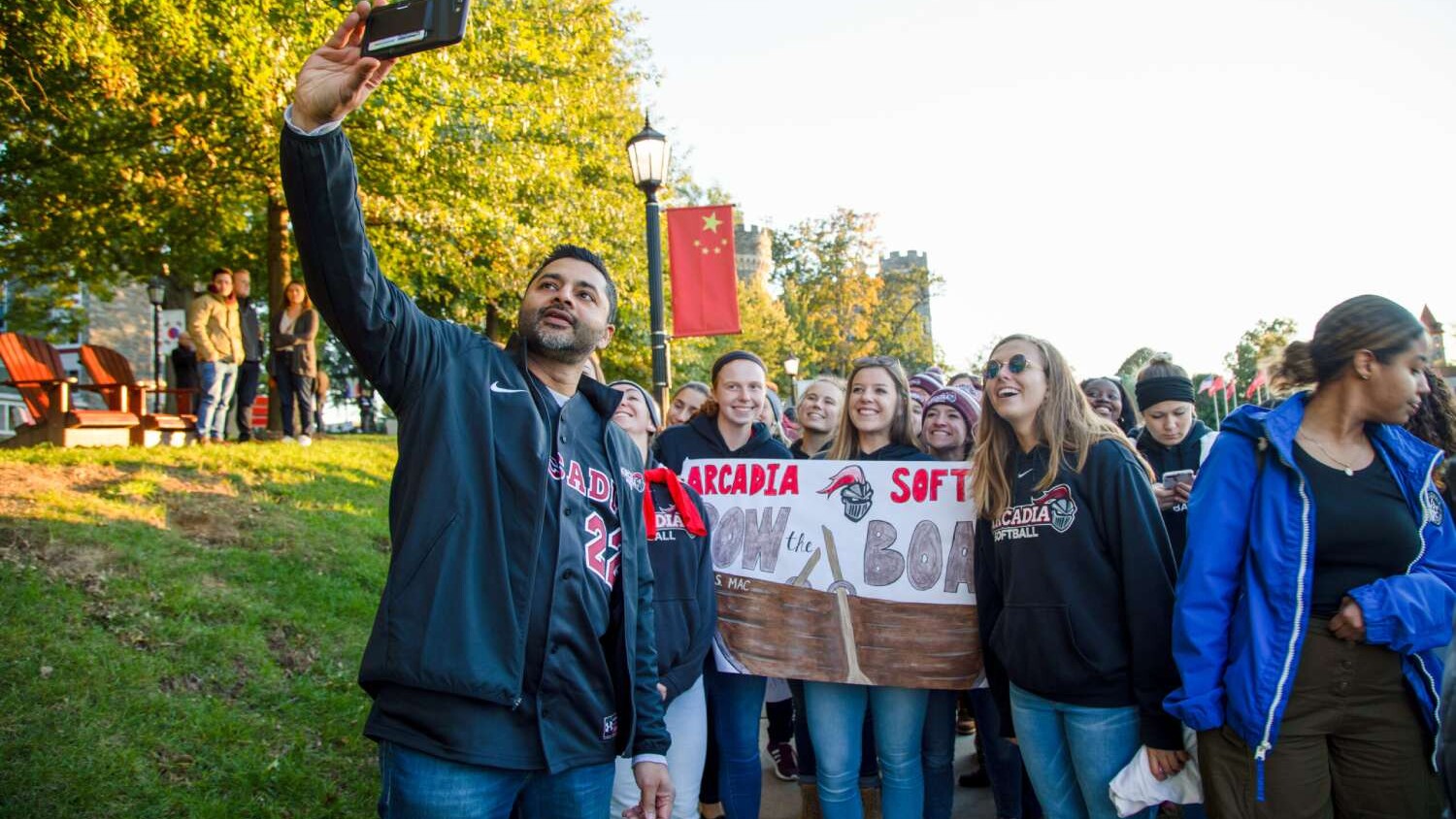 President Nair takes a selfie with students