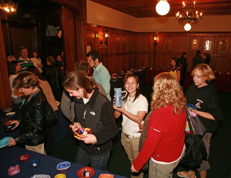 Attendees select their handmade bowls during the 2007 Empty Bowl event, which raises awareness for hunger in the community.
