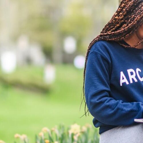 A student on her laptop on Haber Green