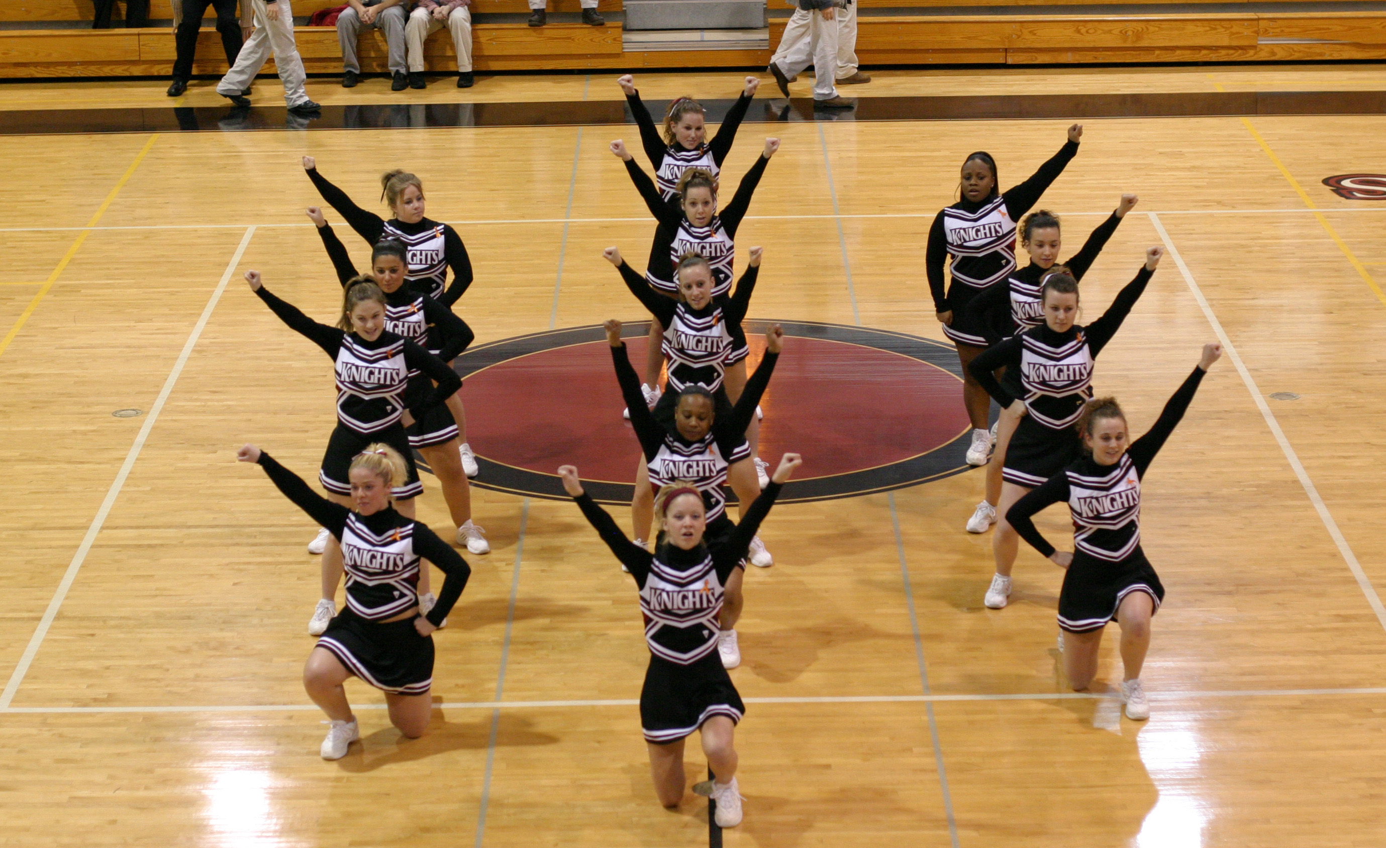 Arcadia University's cheer team performs during a 2005 basketball game.