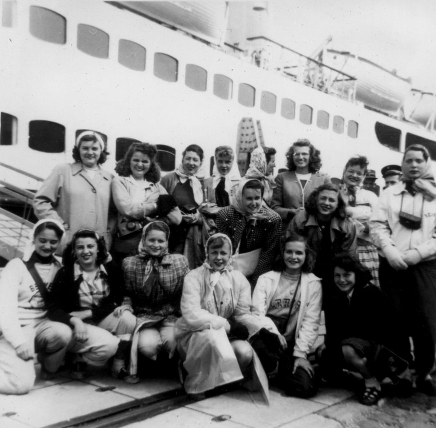 Vintage photo showing students boarding a ship o go overseas.