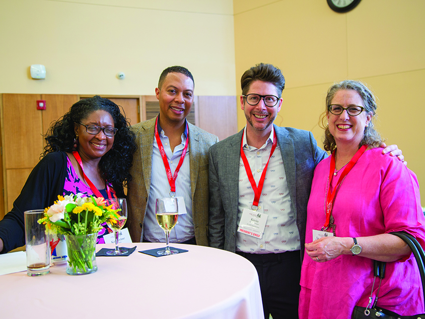 A group of people posing together at an event