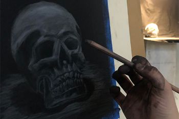 A drawing by Catherine Portelli that depicts a human skull on a black background.