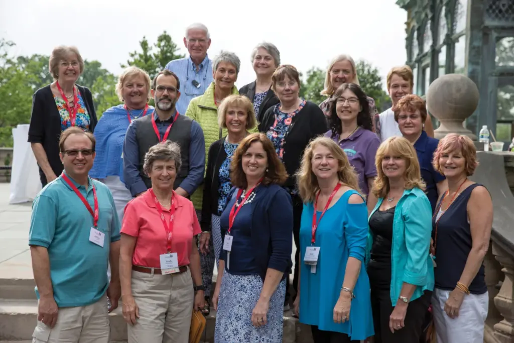 Alumni visit Arcadia University and pose for group photo