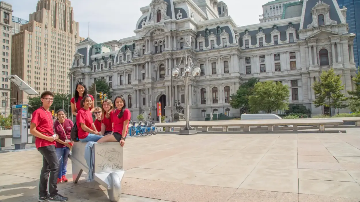 Arcadia students pose in front of a historical building in downtown Philadelphia.