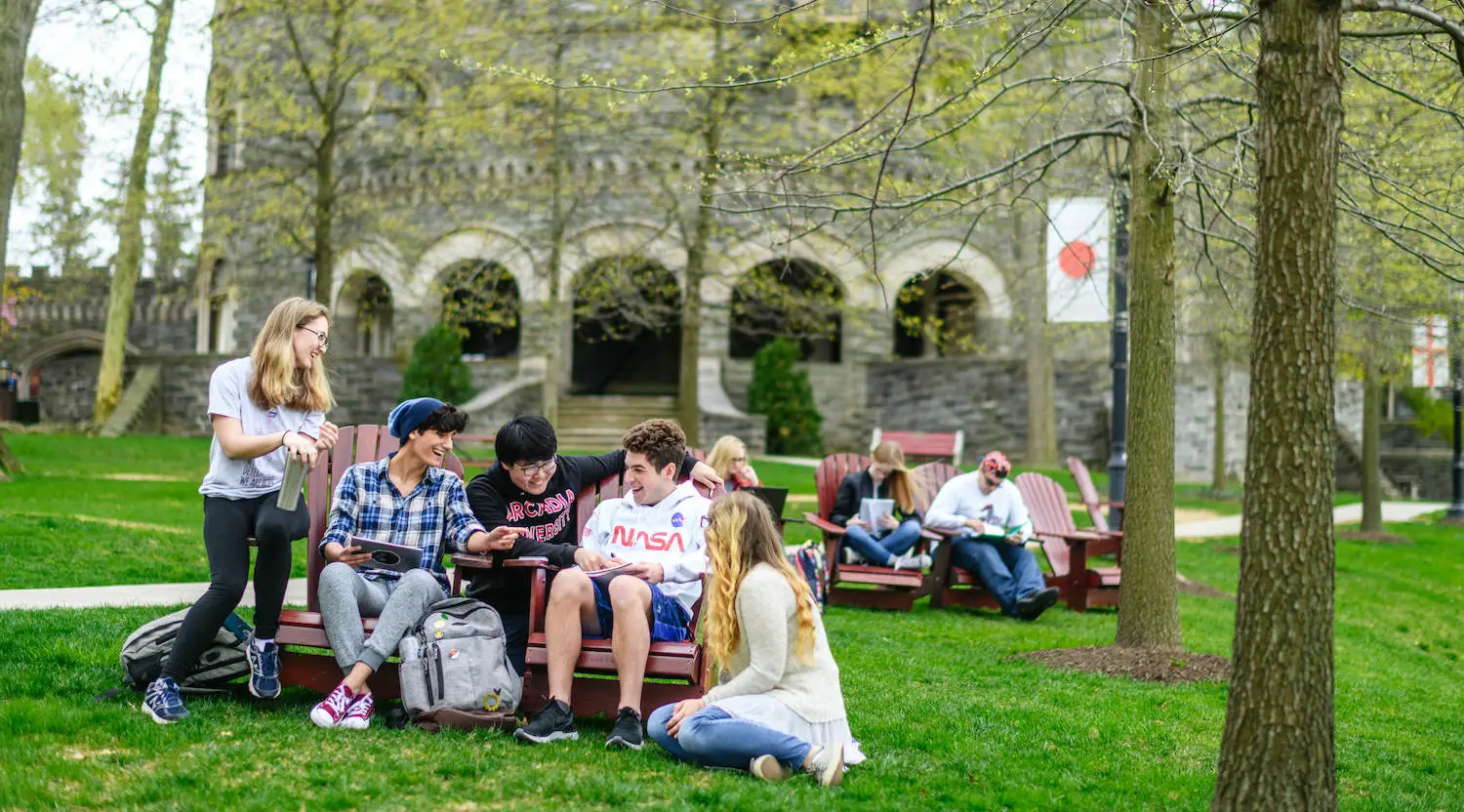 In the spring students meet on the lawn by Grey Towers.