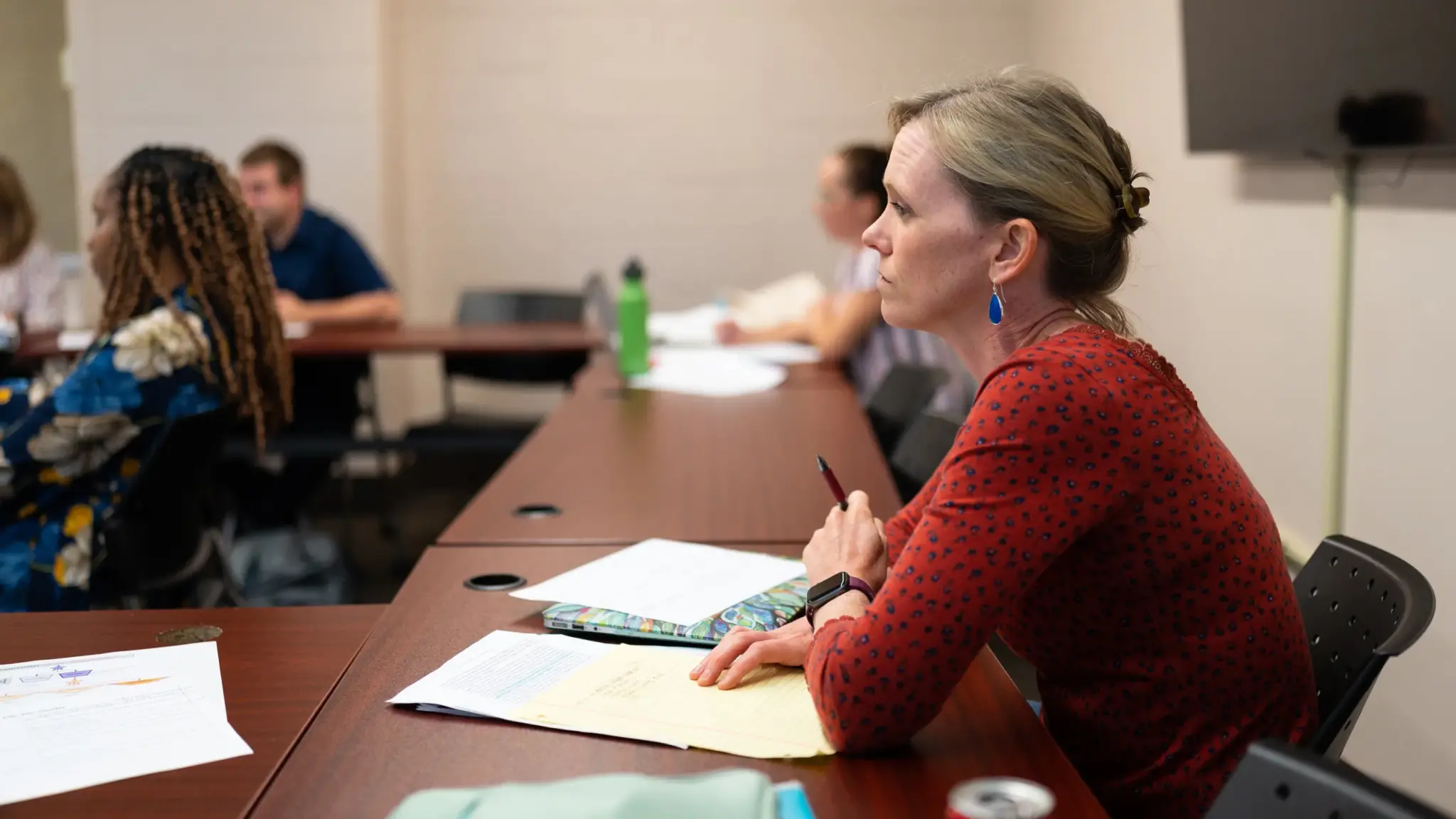 A grad student listens to a lecture