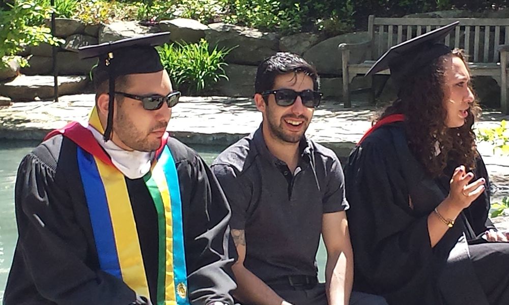 IPCR students in graduation regalia.