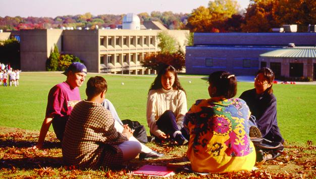 A photo taken of students on the lawn on campus in 1994