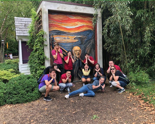 Group of honors students imitate the Scream by Edvard Munch.