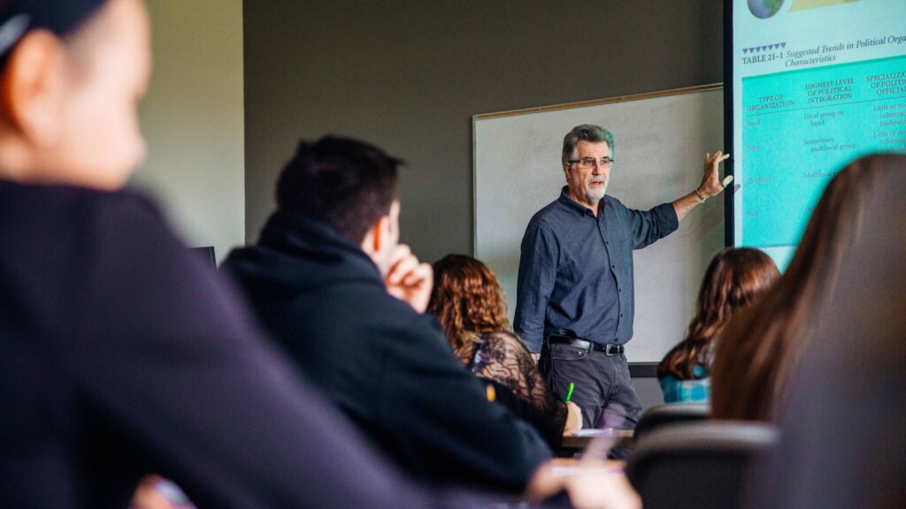 Jon Church lectures an anthropology class.