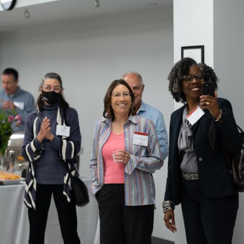 Executive Director of the Parkinsons Council Wendy Lewis, Erika Aaron, former Board Chair Alison Aaron Madsen, Esq. '85, and Vice President of Development and Alumni Engagement Brigette A. Bryant celebrate the unveiling of the new signage of the Dan Aaron Stay Fit Clinic.