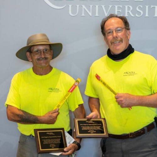 Ed Adams and John McNeil, recipients of the John Hagerty Dependability Award, displaying their award plaques