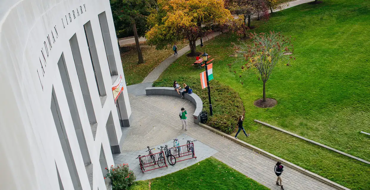 A sky view of the Landman Library entry way and grounds during fall.