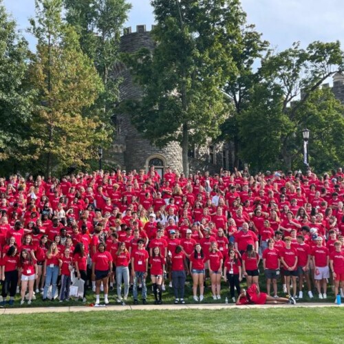 Members of the Class of 2026 gather for a group photo on Haber Green