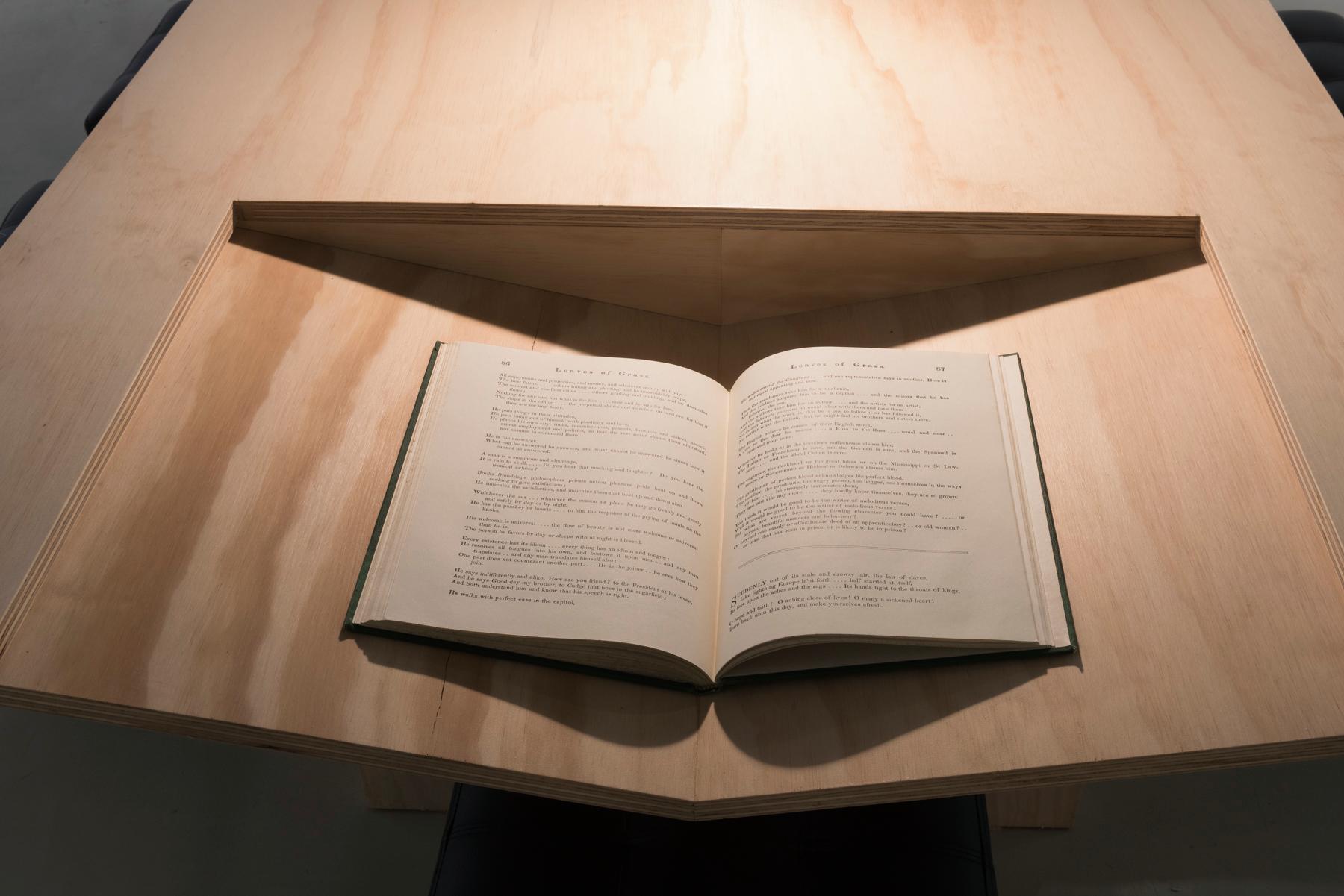 detail of a book resting on a purpose built table from "Writers Making Books"