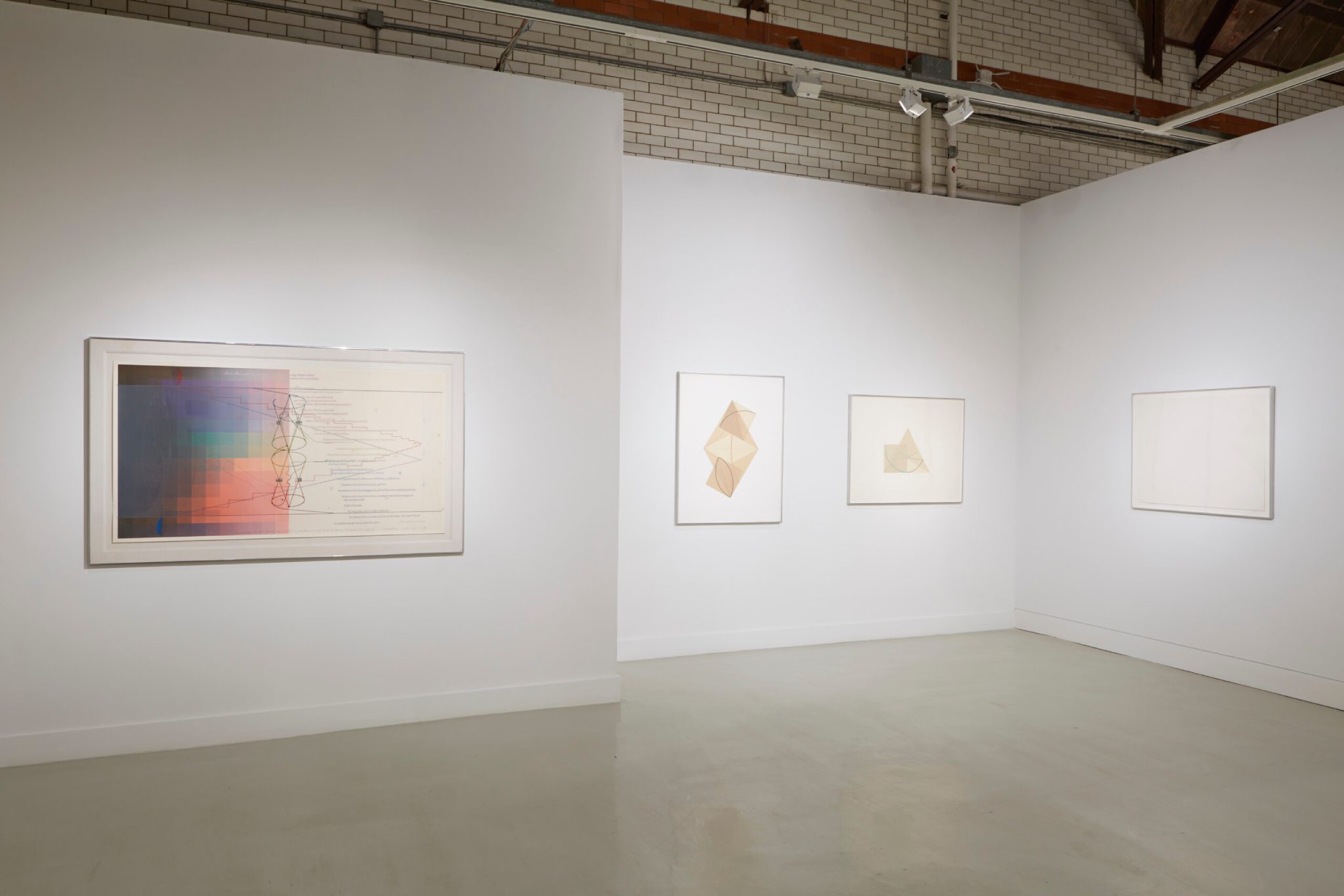 Installation view from "Coordinates: Drawings and Prints Marking Five Exhibitions at Beaver College (1977-84)" featuring four panels of geometric pieces.
