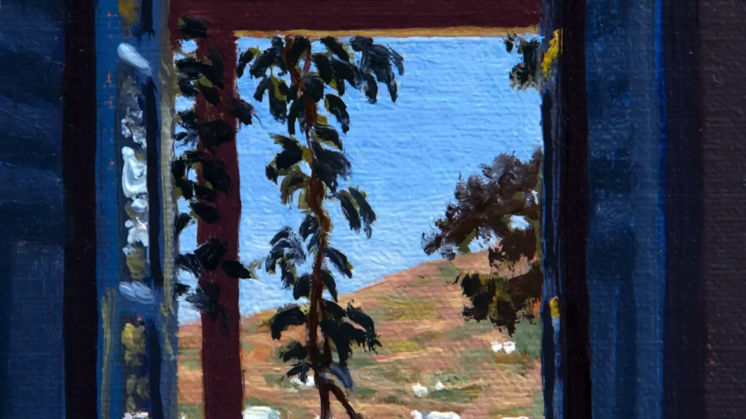 a painting looking out a window onto a landscape of buildings