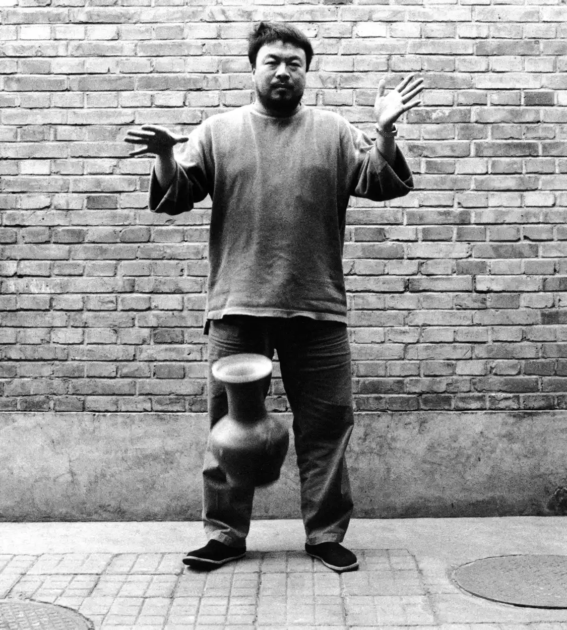 Dropping a Han-Dynasty Urn 1995 second in a triptych of gelatin silver prints each print 49 5/8” x 39 1/4” Courtesy private collection, USA
