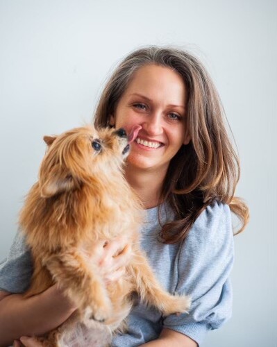 Headshot of Joy Slabaugh, who will earn her Master of Arts in Counseling from Arcadia in 2023, and her dog