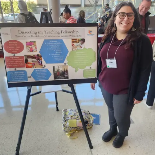 Iliana Correa presents a poster after winning a Student STEM Educator Recognition Prize from the Philadelphia Regional Institute for STEM Educators