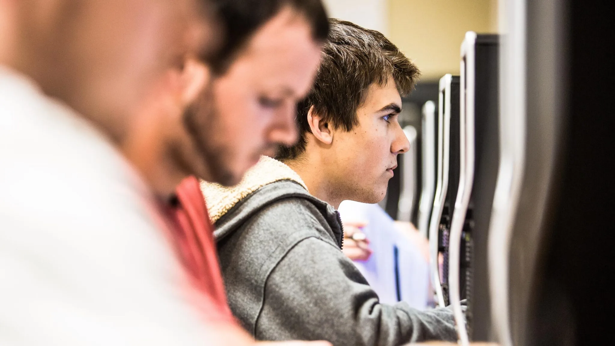 Students use computers in a computer lab.