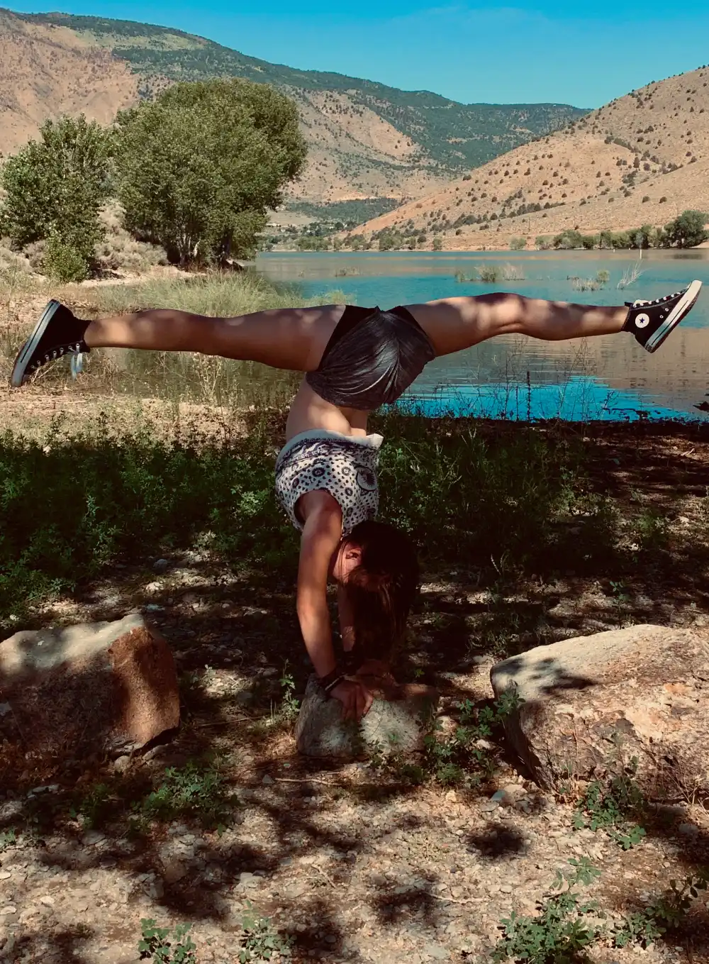 Amellia McGuire Matheny demonstrates her dance ability with a handstand split