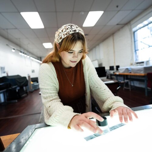 Mackenzie Hillegass in the photo lab located in Murphy Hall