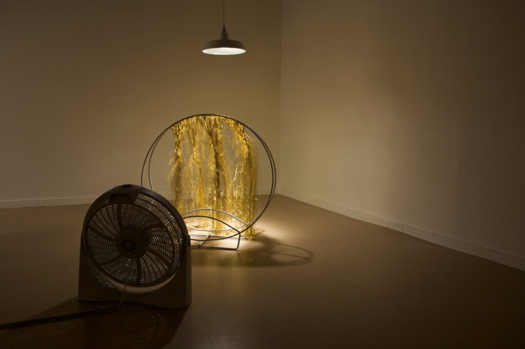 Installation view, "A Closer Look 7", 2008, Spruance Gallery, fan and circle with hanging gold material
