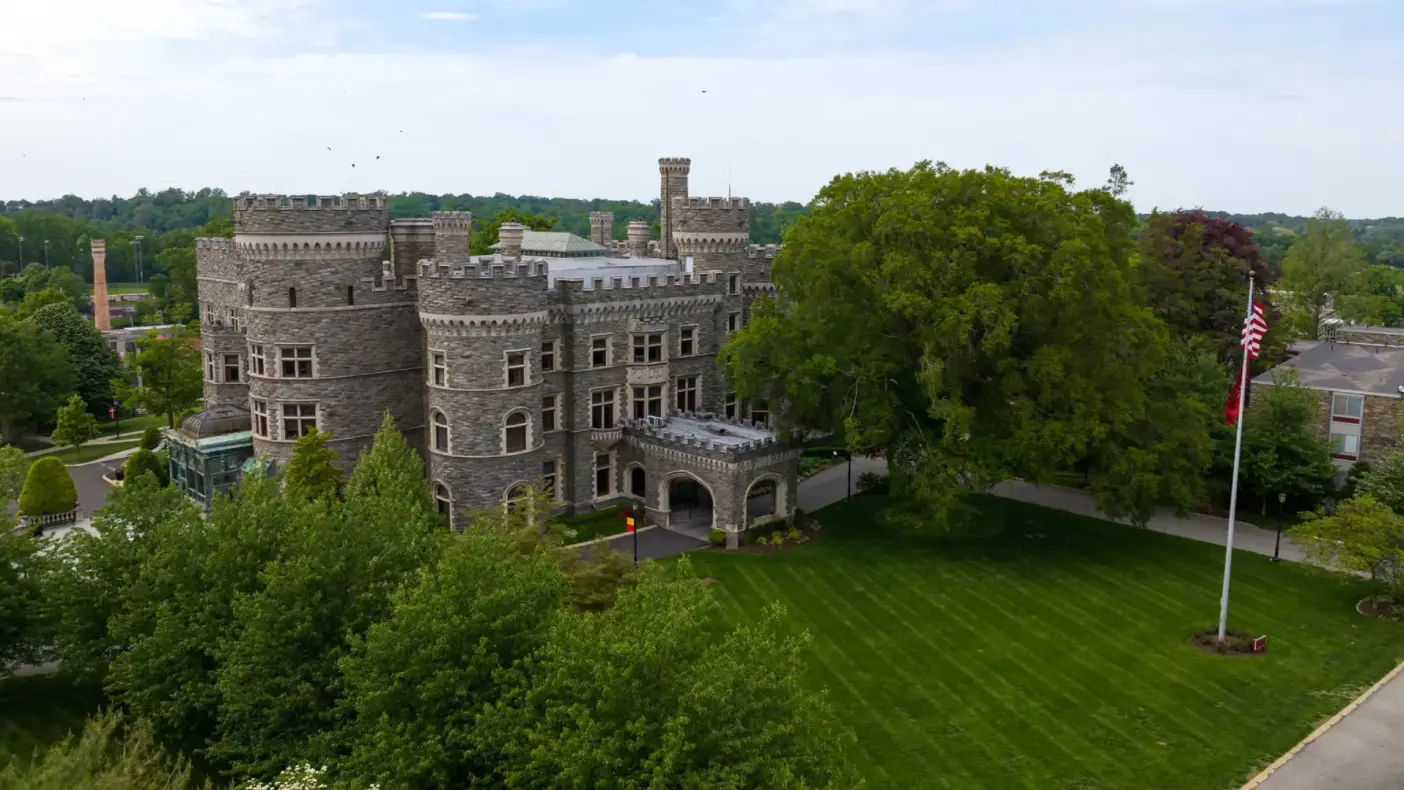 Grey Towers Castle in spring. Aerial view.