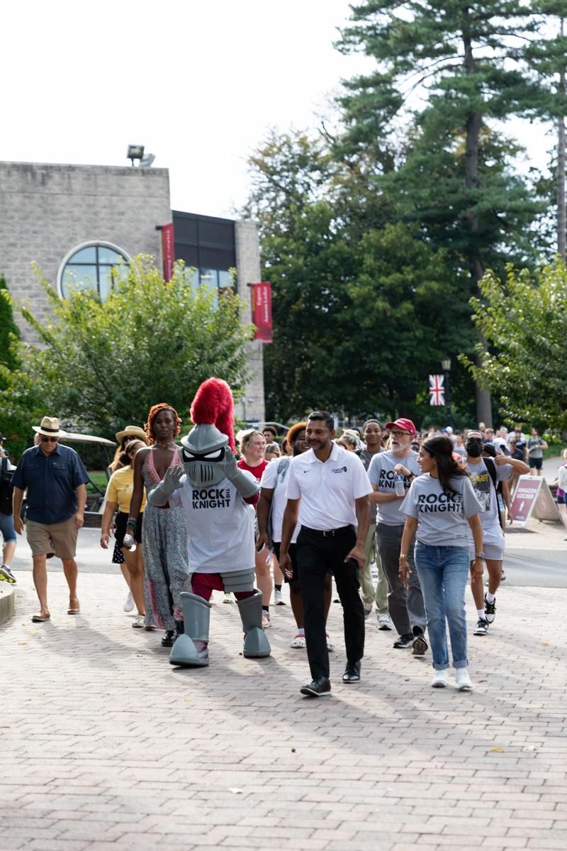 Students process down to the Glenside Food Truck Festival
