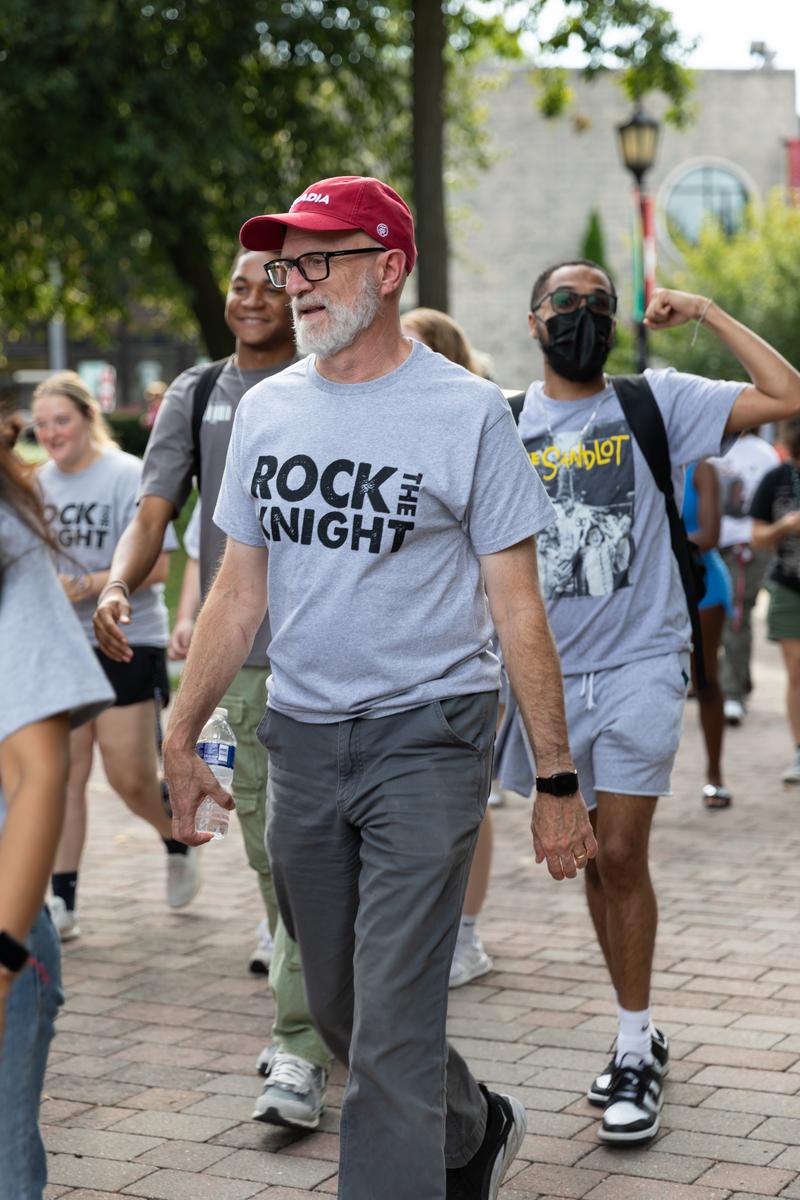 Jeff Rutenbeck, Provost, participates in the procession 