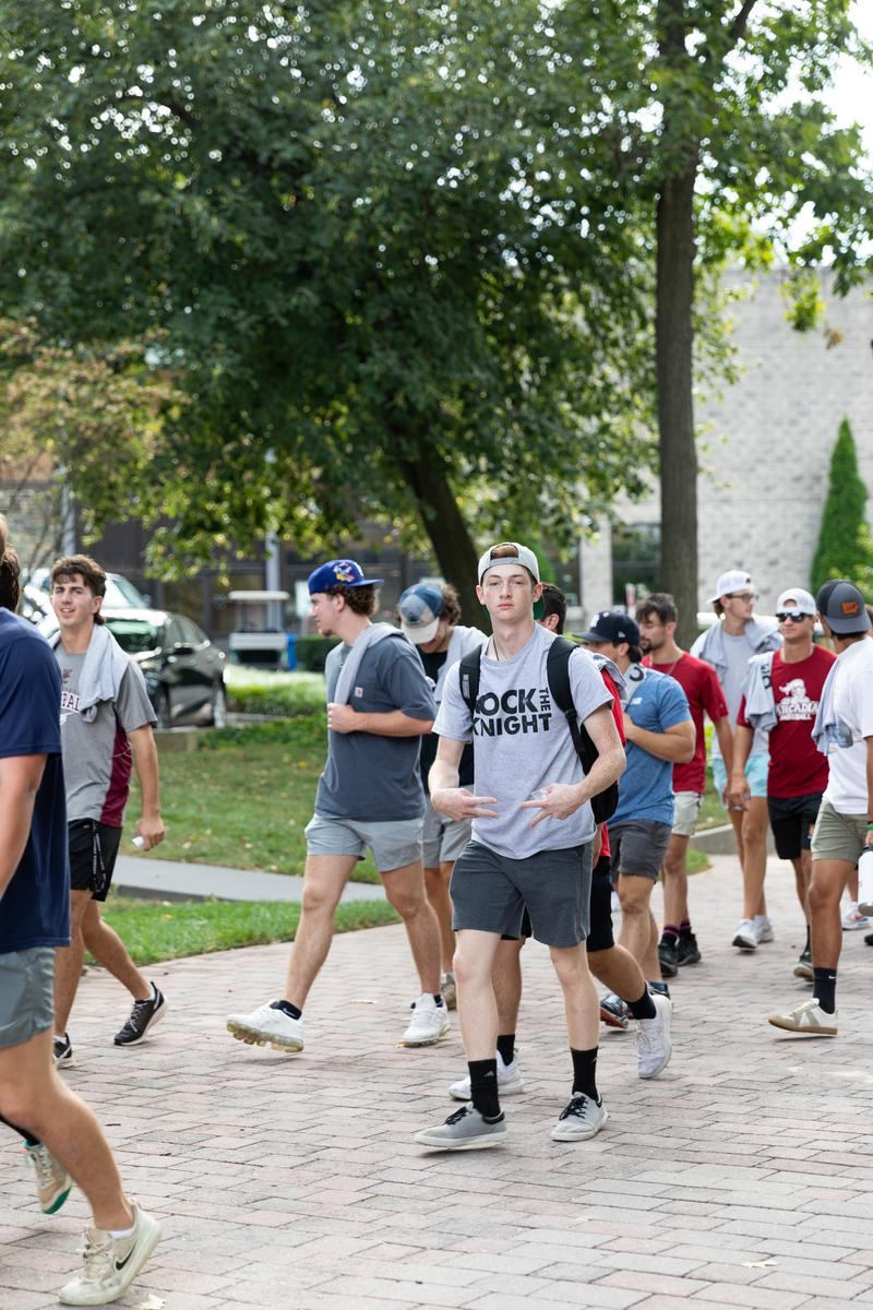 Students process down to the Glenside Food Truck Festival
