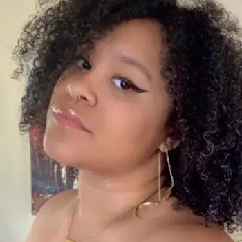 A candid portrait of Honey Testa ’22M, Forensic Science master’s degree