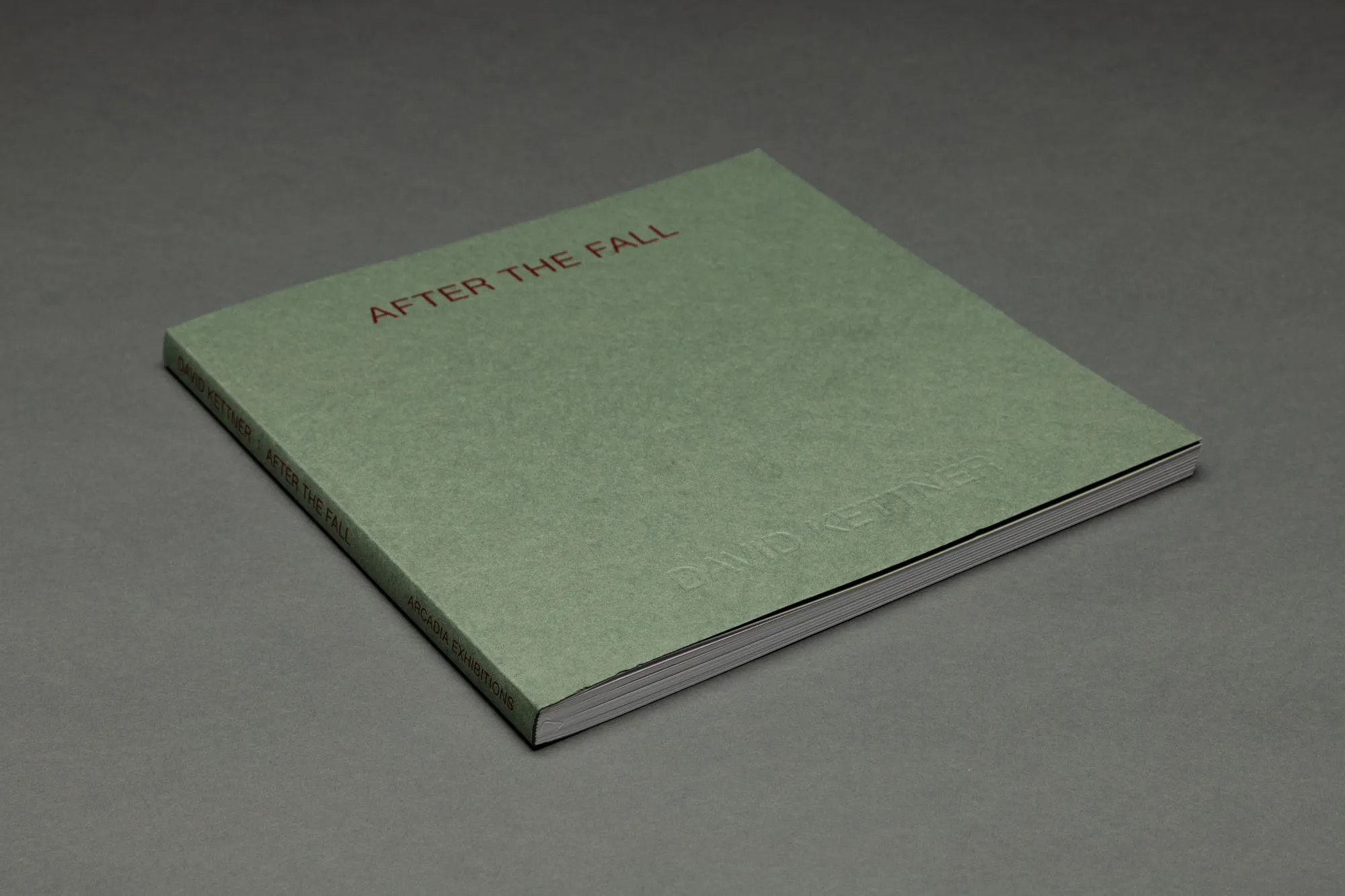 A green covered book entitles AFTER THE FALL.