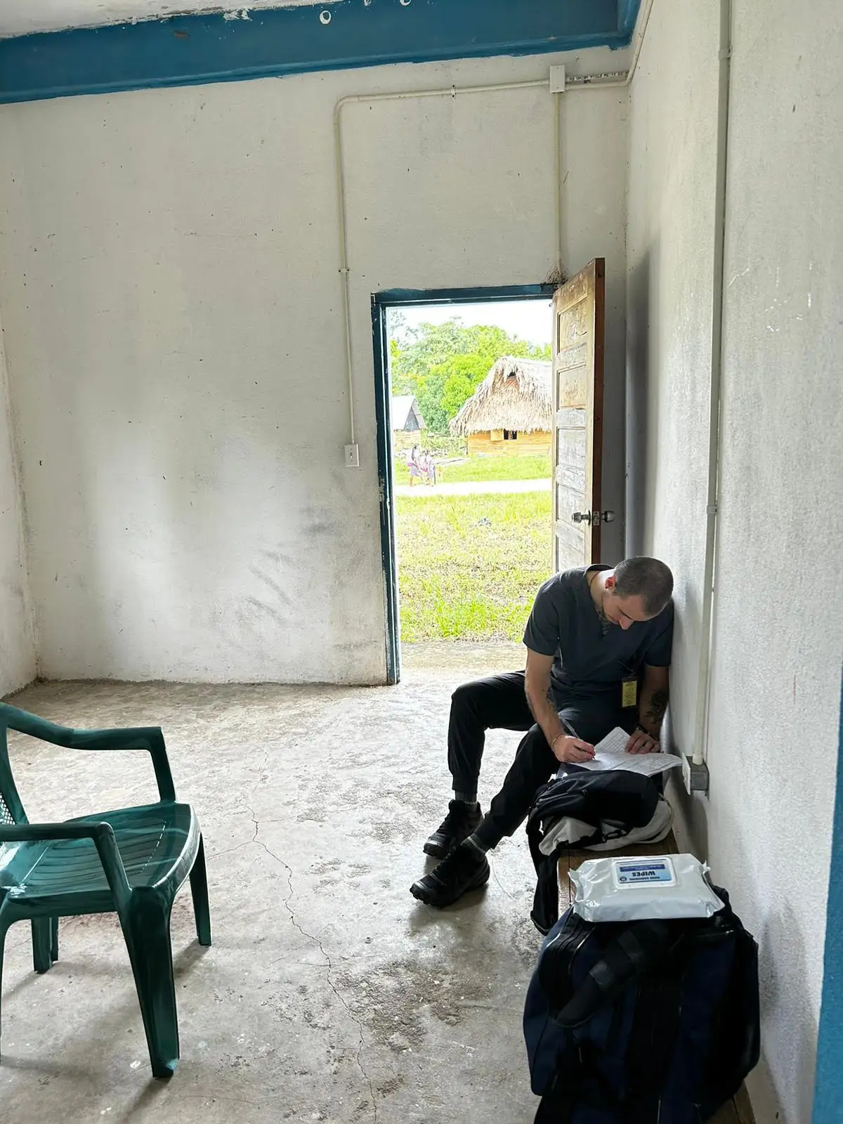 Joe taking notes on a bench.