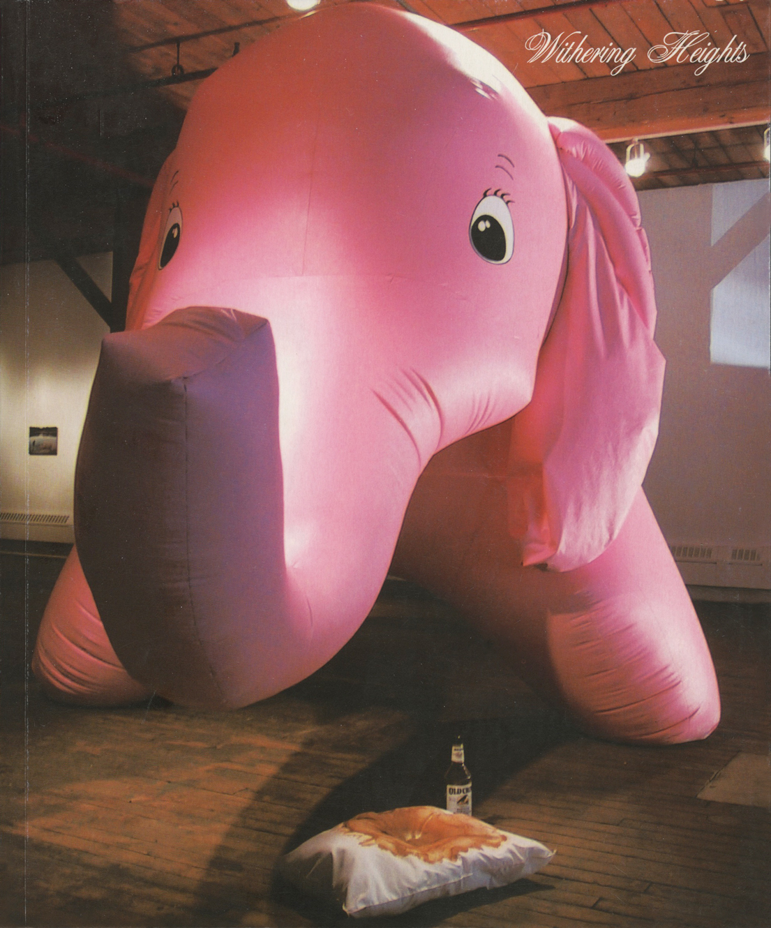 Cover of "Withering Heights." Cover depicts a large pink balloon elephant.