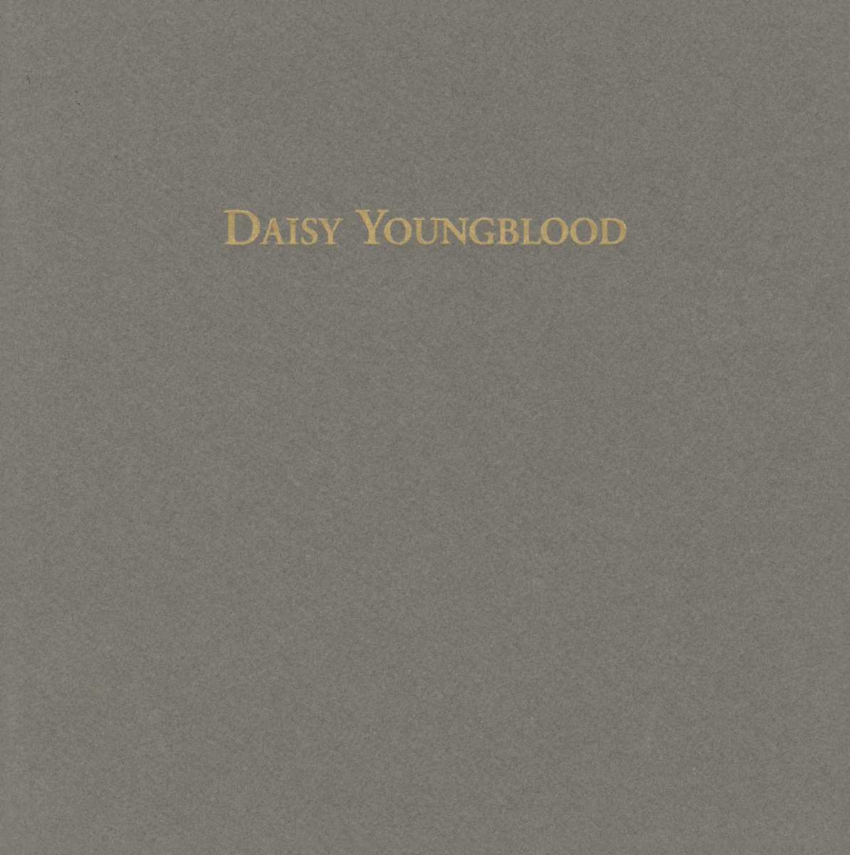 Cover of "Daisy Youngblood." Cover is grey with the title in gold near the top.