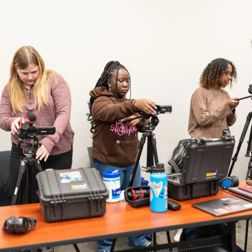 Students working with video equipments.