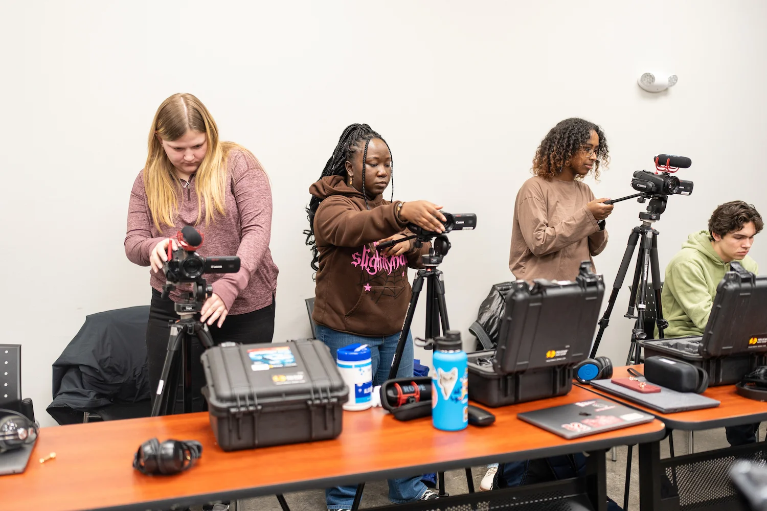 Students working with video equipments.