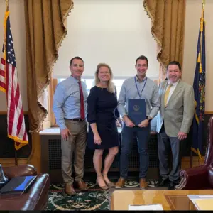 From left to right: Palisades High School Principal Richard Heffernan, Palisades School District Superintendent Dr. Bridget O'Connell, Dylan Fedell '19MEd, PA State Rep. Craig Staats