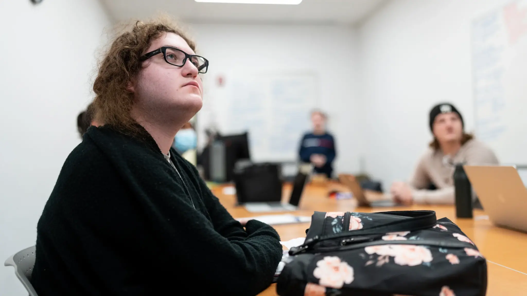 Students listen to a Philosophy presentation