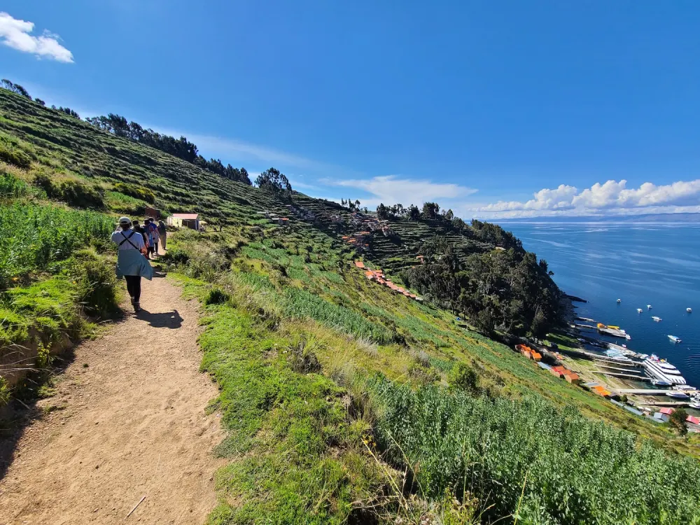 PT students walking along a hillside in Bolivia.