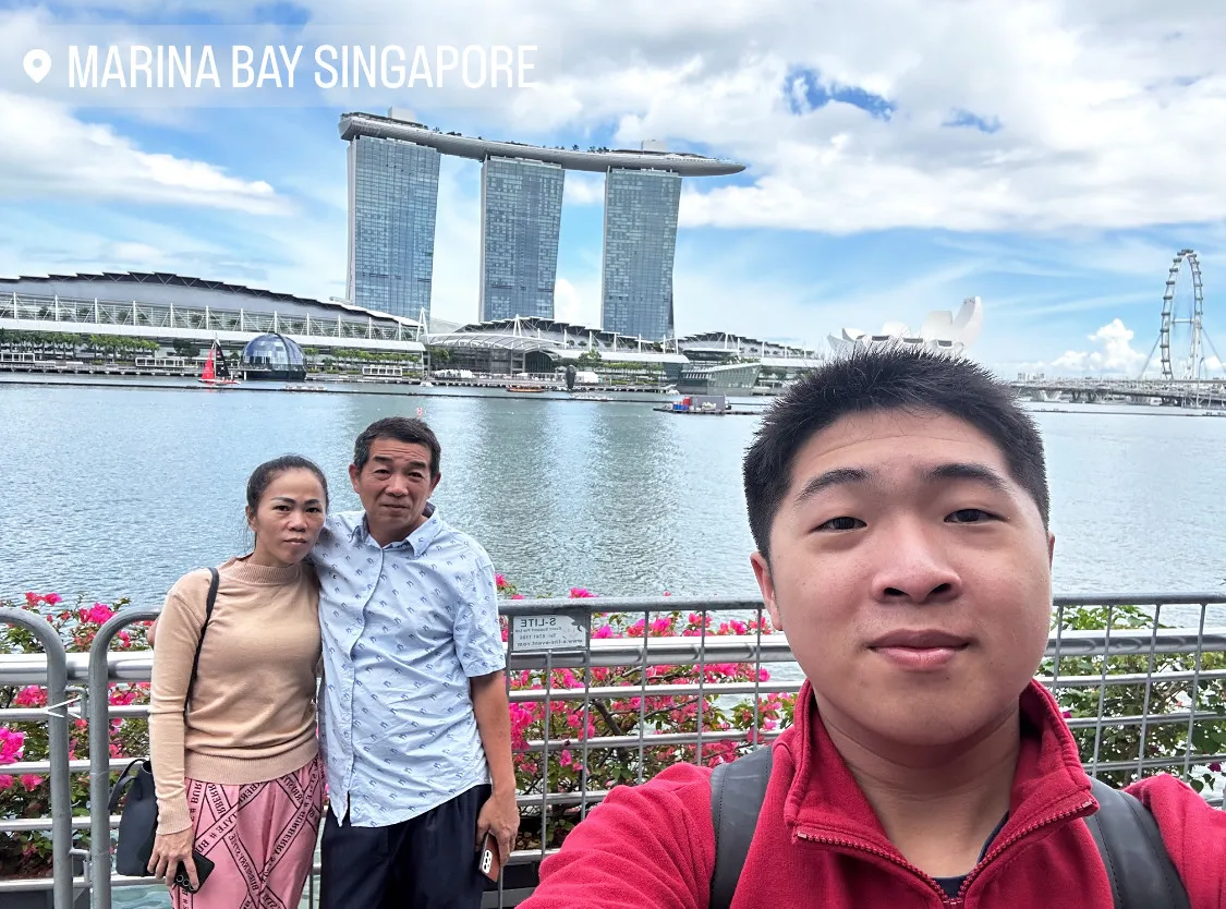 Chayhok and his family in Singapore.